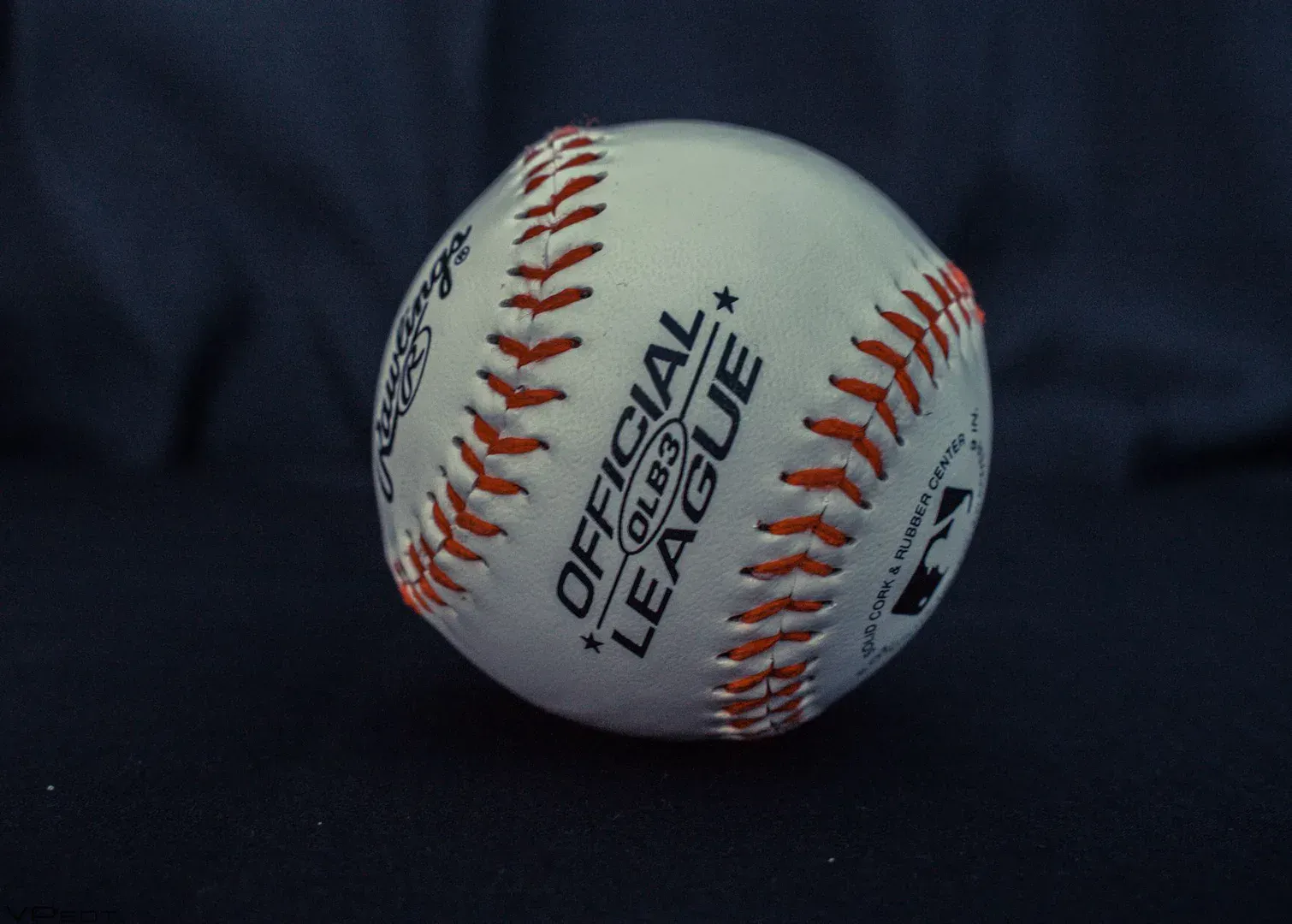 Kickball set on a lawn, ready to play