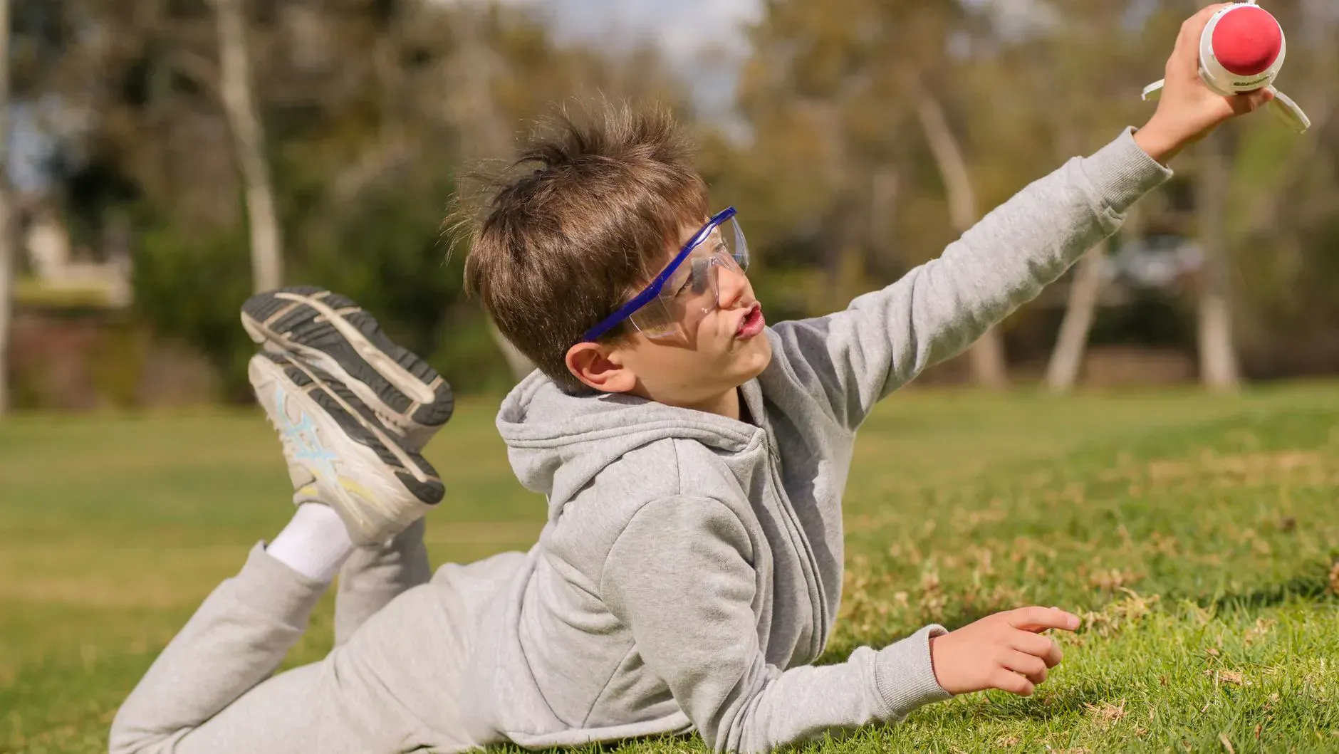 Stomp Rockets set on a lawn, ready to play